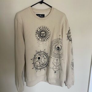 Neutral crewneck with astrology design